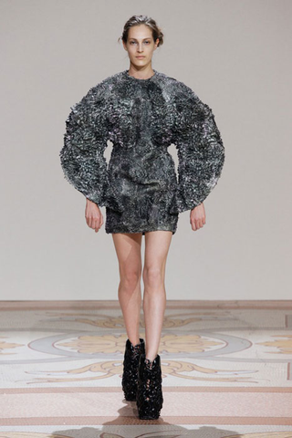 Illustration for article titled These spiky runway dresses are created from iron filings and magnets